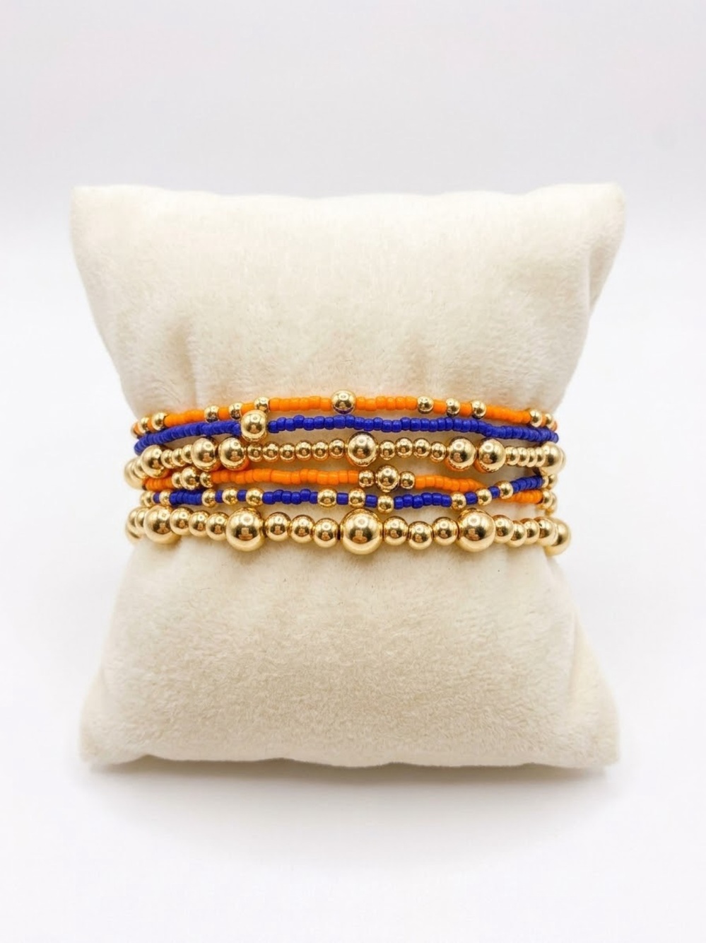 Gold Beaded Stack Bracelet with Orange and Blue Accents
